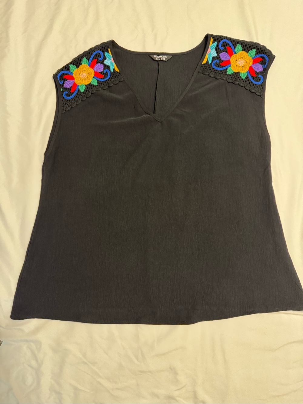 BloomChic Black Sleeveless V-Neck Top with Multicolor Crochet Shoulders
